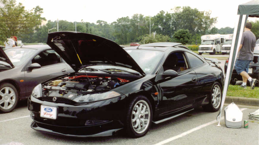 1999 Mercury Cougar V6 5-Speed MTX with way to many mods to list.  On display at a car show in Virginia Beach 2003.