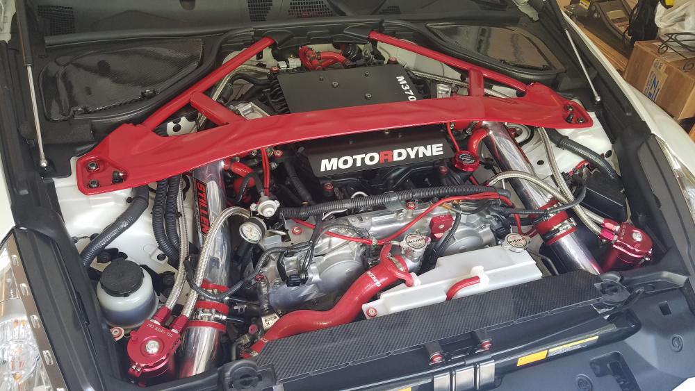 Latest Engine Bay Shot
Additions: 
1. Synergy Composites battery and master cylinder carbon fiber covers.
2. Strut Cap Covers
3. Black titanium strut tower hardware
4. Z1 hood struts