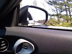 Passenger side convex mirror.  This is one of the three things you can do to eliminate the dreaded blind spot.