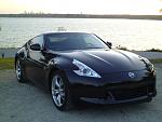 This is at White Rock Lake on a Sunday afternoon, the city skyline behind my Fairlady.