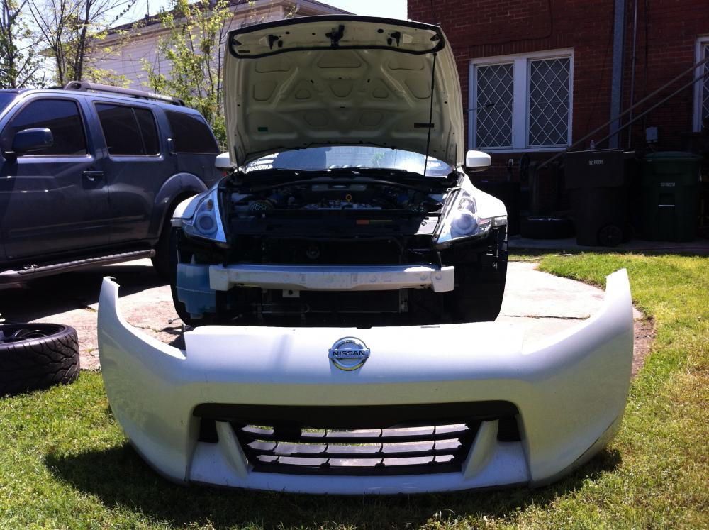 Taking off bumper and found a mounting plate loose on the bottom.