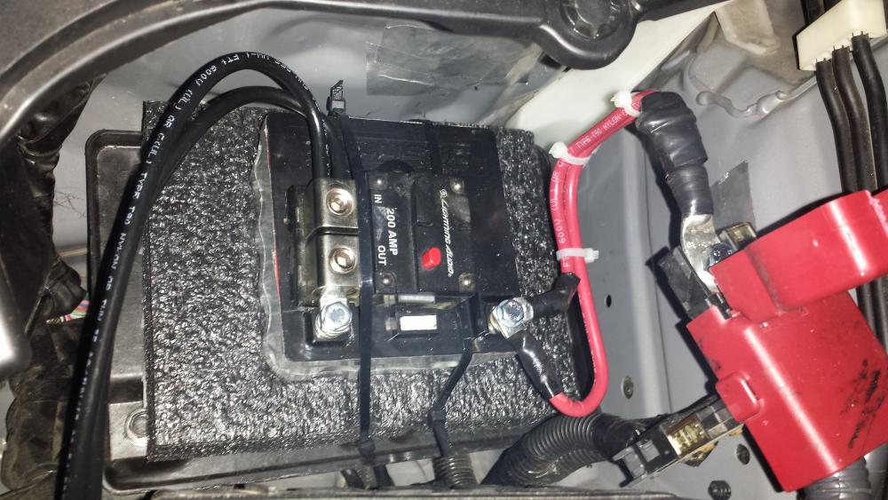 Evo2 16-cell installed in stock battery box.  2x6AWG cables on each side, and my LCB-200 breaker as a safety valve and convenient battery kill-switch while working on the car.