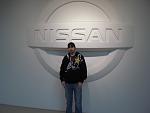 012 
 
Me in front of the Nissan logo