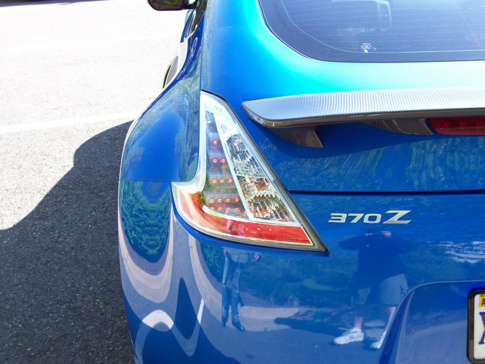 JDM rear taillights with CF spoiler.