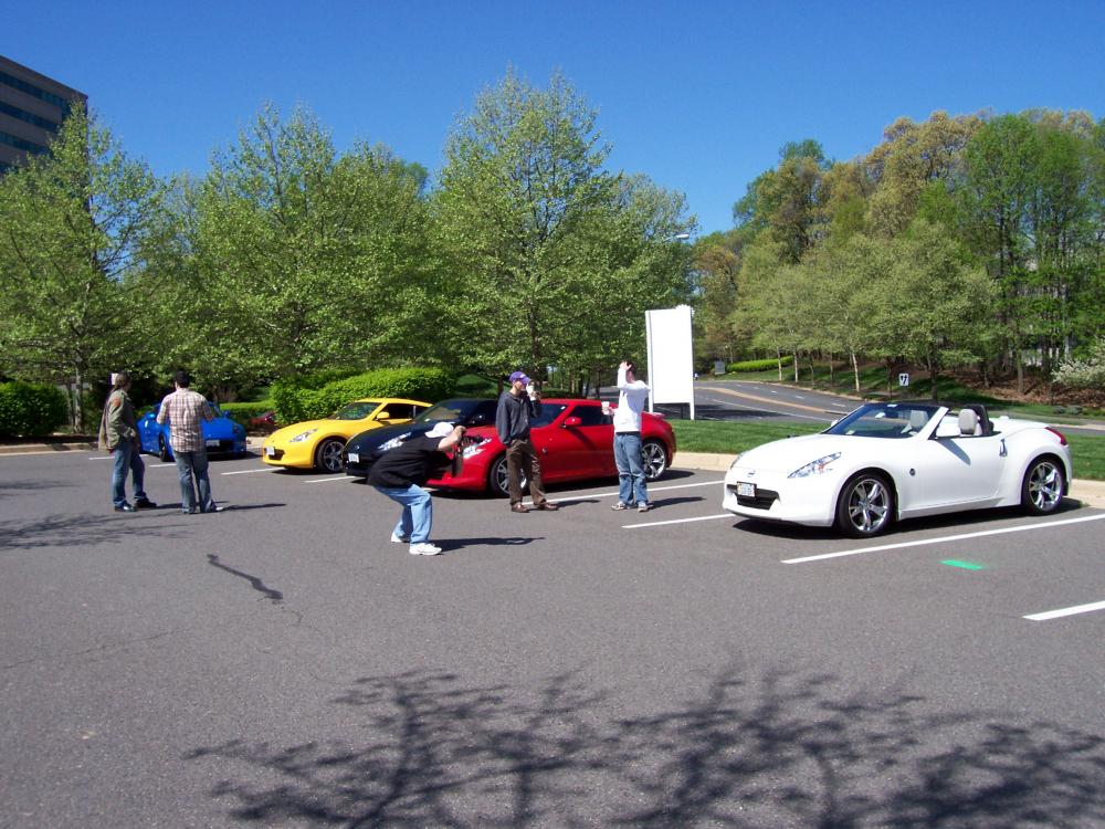 The group talking Z. Oh hey, what is that? A Chicane Yellow 370Z. Lance I think you have company!