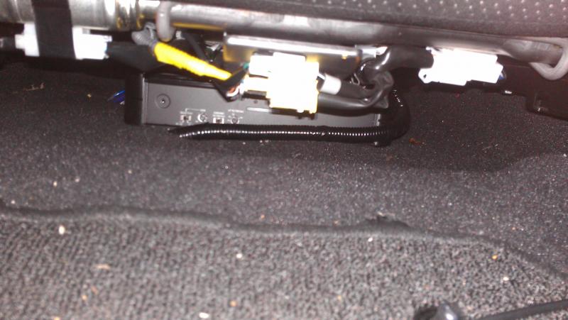 Front view of amp under passenger seat